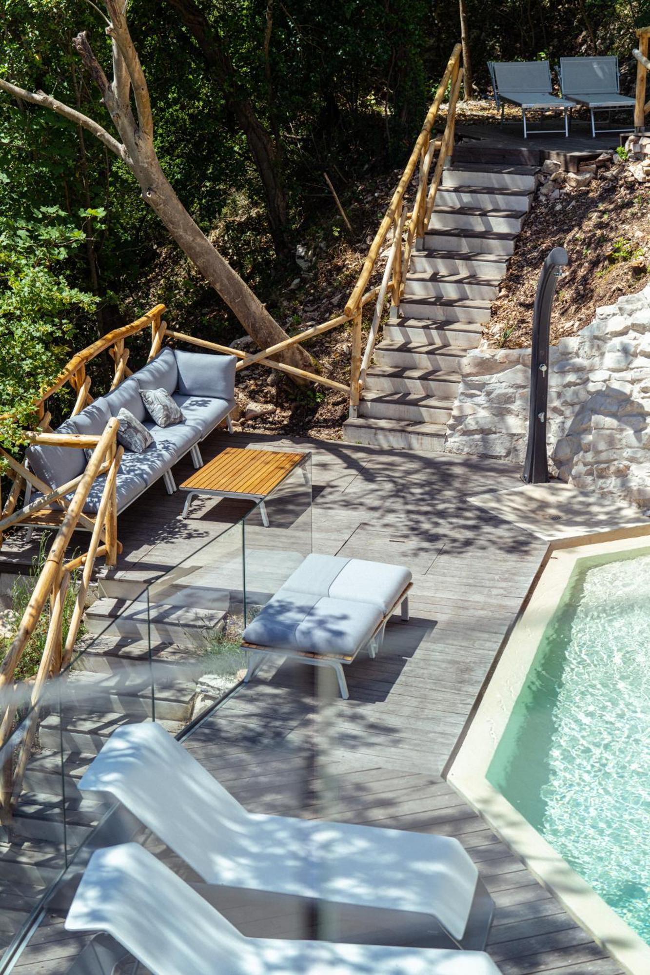 La Forestale Luxury Ecolodge Piano Terra- Appt อัคกวาลาญา ภายนอก รูปภาพ
